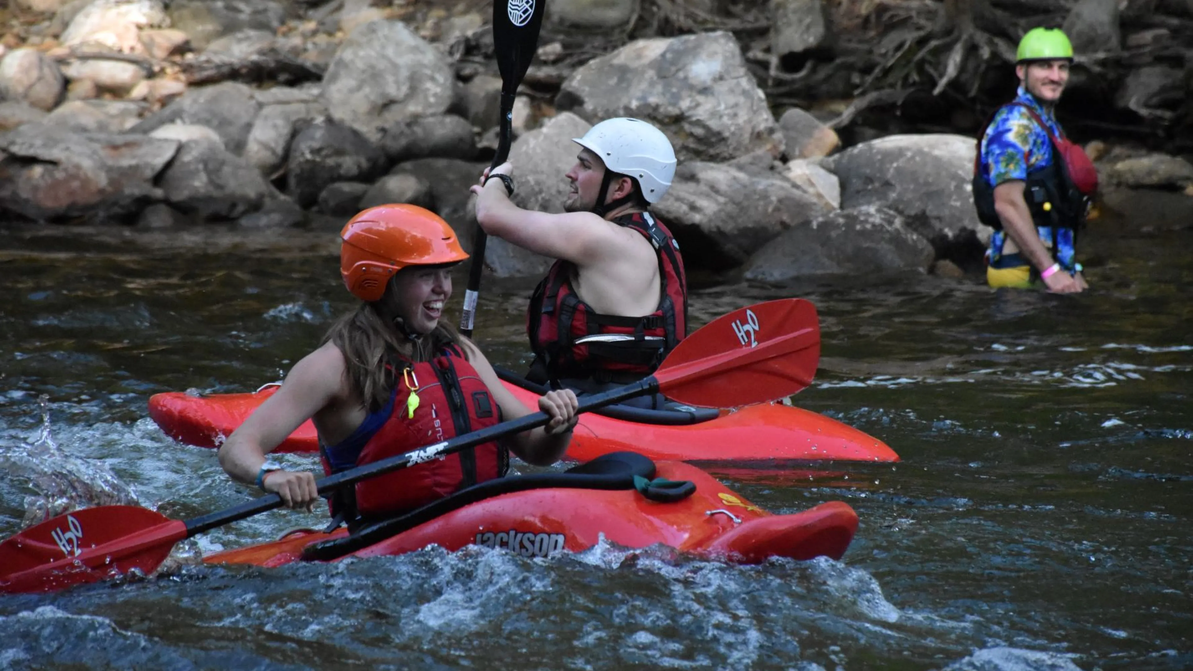 Camper in red kayak