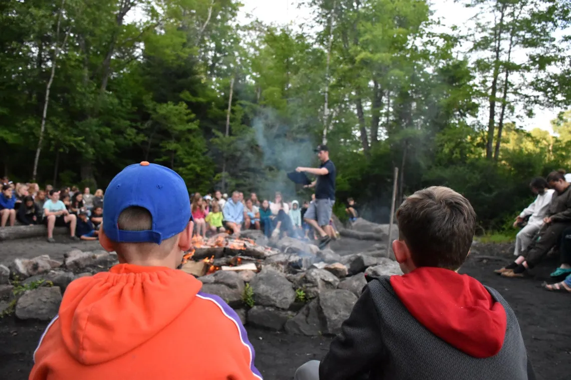 Reading of the charter around the campfire